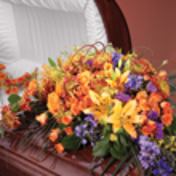Casket Spray of various flowers from Sidney Flower Shop in Sidney, OH